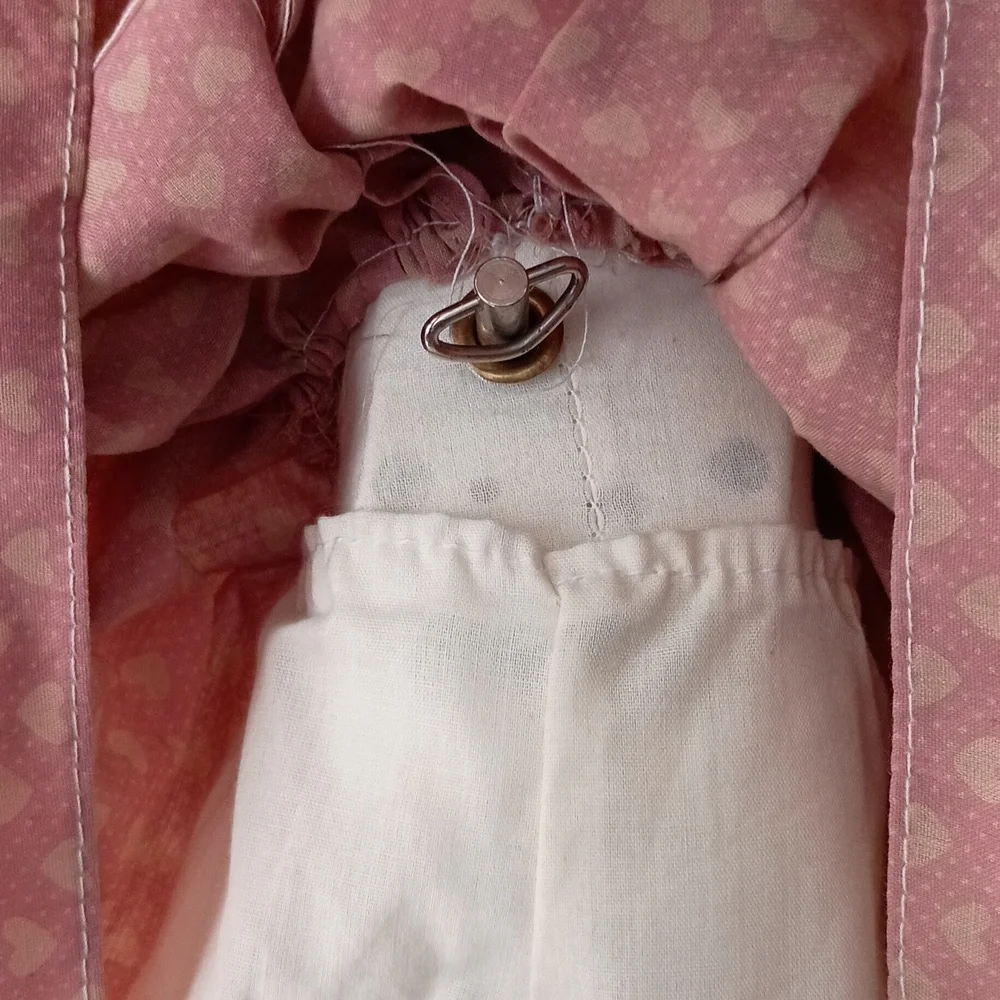 Vintage Porcelain Doll with Pink Dress and Bonnet by Dynasty Dolls
